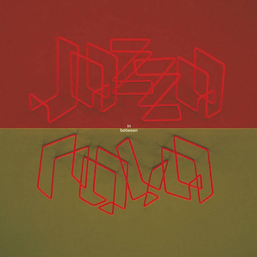 Jazzanova InBetween  Album cover. Red on the top half with  the works 'jazza', gold on the bottom half with the words 'nova'