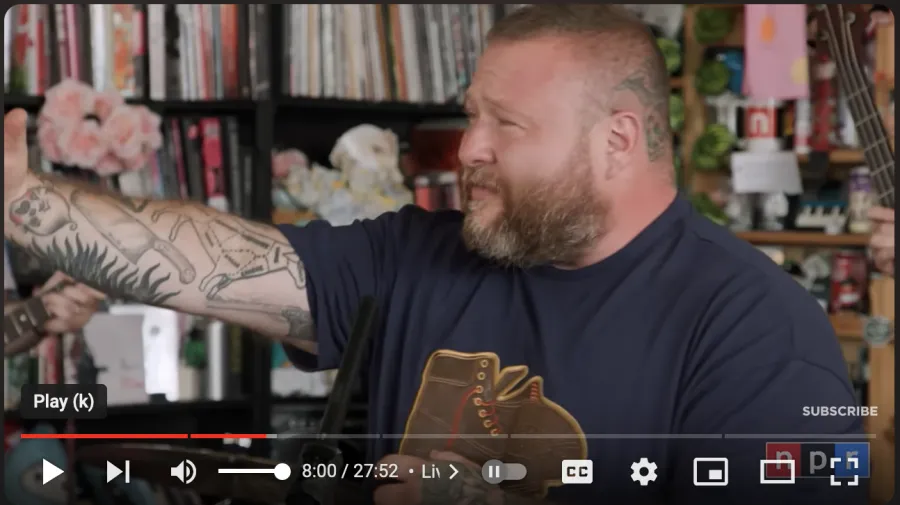 Thumbnail for the youTube video showing Action Bronson signing