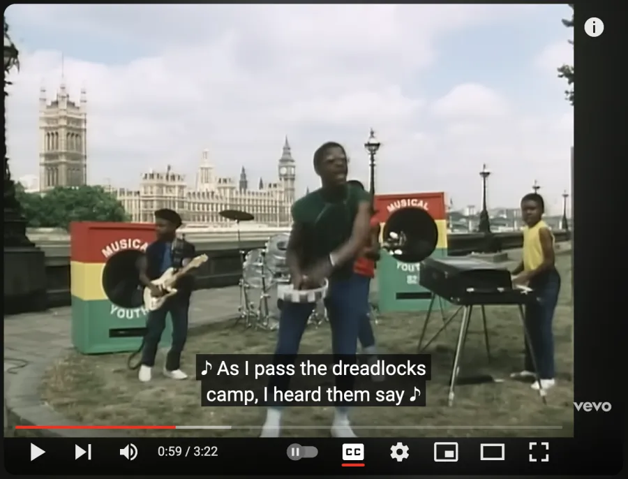 Thumbnail for the youTube video showing young kids playing in a setup band in a urban african setting