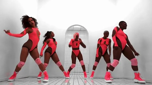 Promo screenshot from the Bubblegum video - 5 female dancers in a futuristic scene